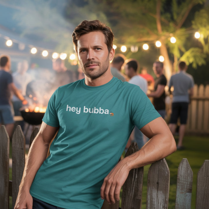 Man wearing a 'hey bubba' t-shirt at an outdoor gathering.